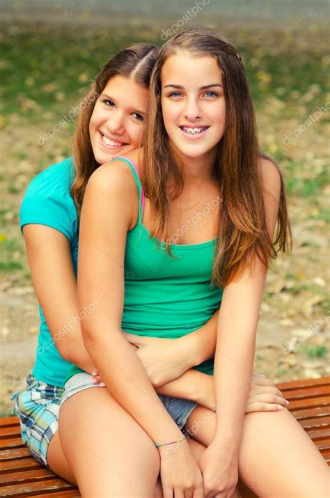 Two Teenage Girls Having Fun Stock Photo By Solidphotos