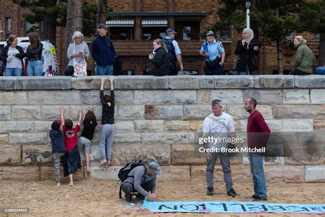 Extinction Rebellion Activists Gather At Manly Beach On October 11