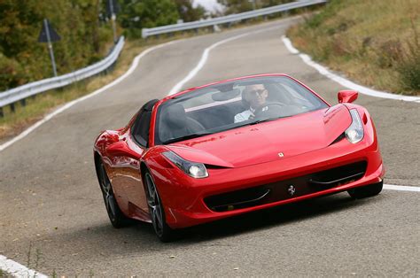 Indeed, my only other complaint is that the wiper/washer button incorporated into the steering wheel is a little finicky. Ferrari F458 Spider Test Drive Maranello Ferrari