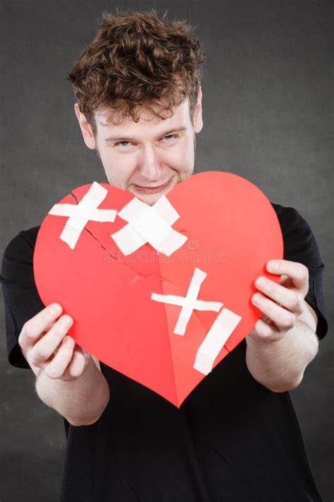 Very Sad Young Man Holding Broken Heart Stock Image Image Of Symbol