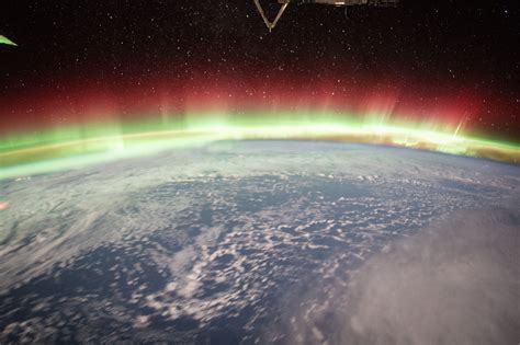 A Brilliant And Vivid Aurora Borealis Illuminates The Earths Northern
