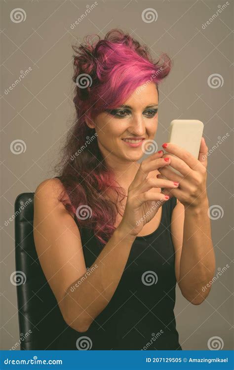 Beautiful Woman With Pink Hair And Make Up Against Gray Background Stock Image Image Of People
