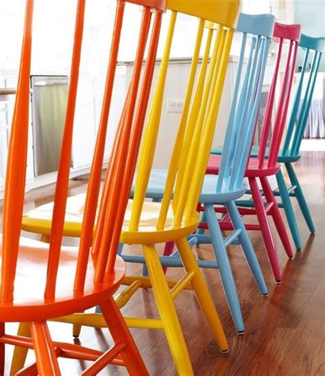 Set of 6 metal ladder back coral colored dining chairs with black seats and backs. Color Your World with Painted Furniture