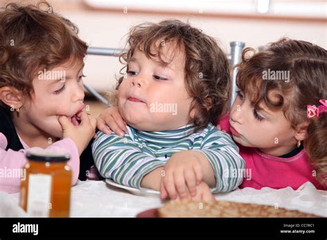 Children Eating Pancakes Stock Photo Alamy