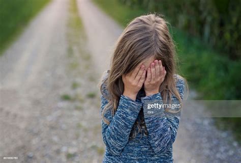 Girl Covering Face Photo Getty Images