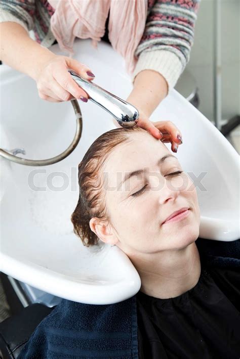 A Woman Getting Her Hair Washed In A Hair Salon Stock Image Colourbox