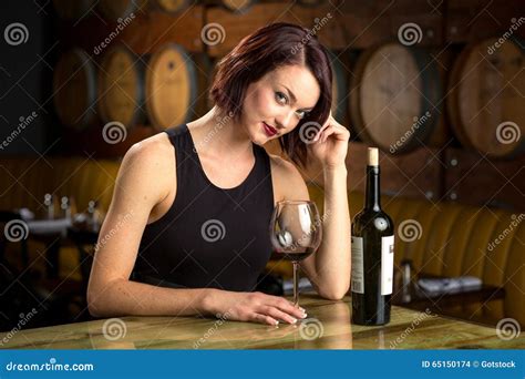 Single Female Alone At Restaurant Bar Drinking Wine Alone Seductive