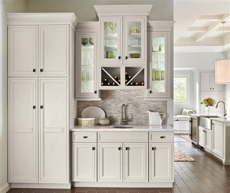The warm wood cabinets achieve. Off White Kitchen Cabinets - Decora Cabinetry