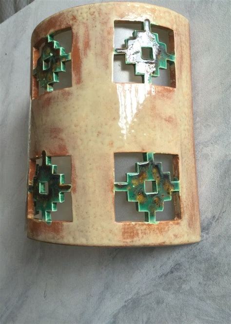 Beautiful Ceramic Wall Sconces For Your Interior Or Exterior Decor Add