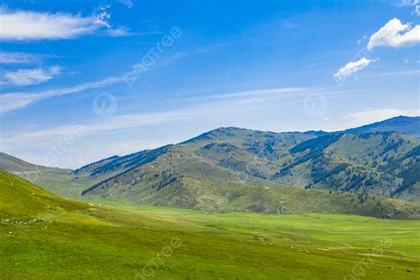 Blue Sky White Clouds Grassland And Mountains Background Blue Sky And