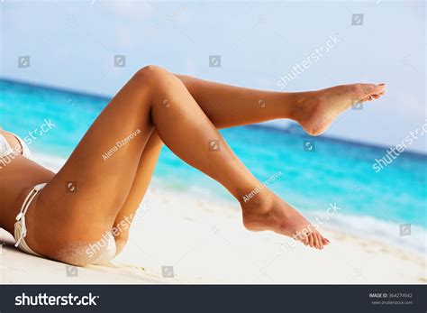 Womens Beautiful Sexy Legs On Beach Stock Photo Edit Now 364274942