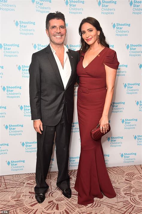 simon cowell joined by girlfriend lauren silverman as they lead the stars at shooting star ball