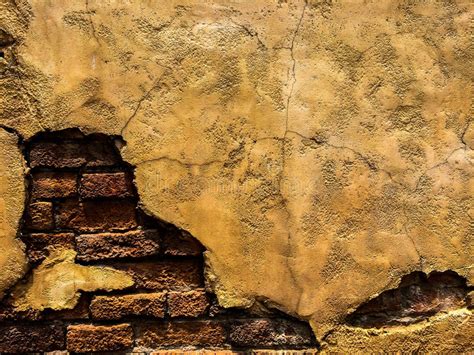 Cracked Old Vintage Brown Concrete Wall With Brick Background Texture