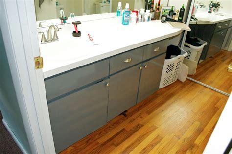To quickly revamp your bathroom without any demo work, update the vanity with a colorful paint job in just a few days. Seesaws and Sawhorses: Painting A Laminate Vanity | Vanity ...