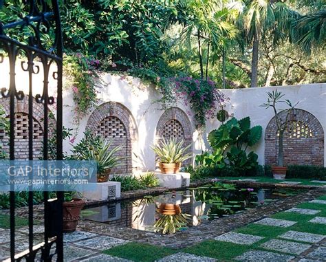 Gap Interiors Classic Courtyard Garden With Pond Image No 0063028