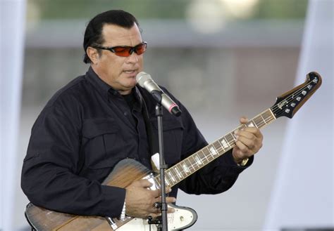 2160x1440 Resolution Steven Seagal Playing Guitar While Singing Hd