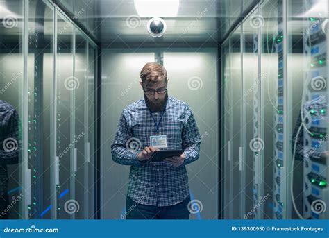 It Engineer With Tablet In Server Room Stock Photo Image Of Network