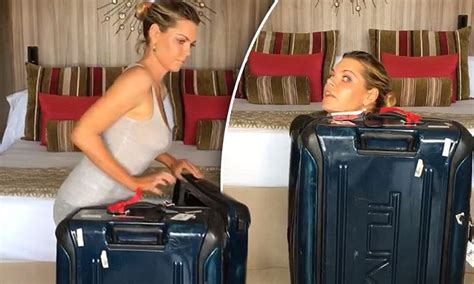 Love Island Host Sophie Monk Attempts To Zip Herself Into Suitcase