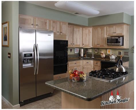 Assembled cabinets by the manufacturer (not assembled rta) cabinet sides unfinished. Natural Maple Wood Cabinets. Granite Countertop ...
