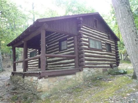 There is a master bedroom with a double bed and a sleeping loft with two double beds. Fireplace & Bathroom w/shower - Picture of Cacapon Resort ...