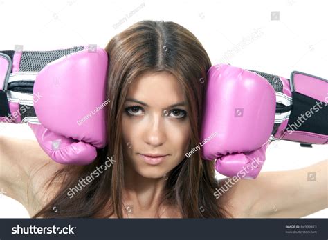 Beautiful Boxing Woman In Pink Box Gloves Ready To Attack Isolated On A