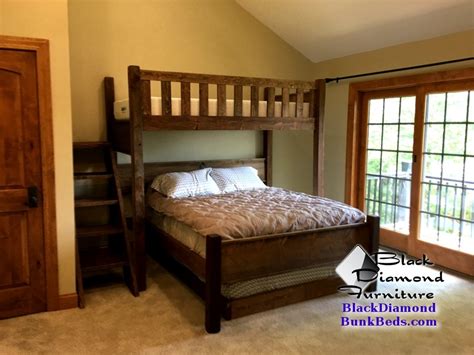 There are 2 ladders built right into the frame, one on each side. Promontory Custom Bunk Bed