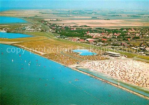 Robben beobachten reiten am strand der nordsee ist ebenfalls ein erlebnis, das kaum zu toppen ist. Ak Norddeich Norden Ostfriesland, Fliegeraufnahme, Meer ...