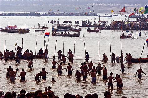 Hindu Pilgrims Bathing In Ganges River At Sangam On Paush Purnima Day