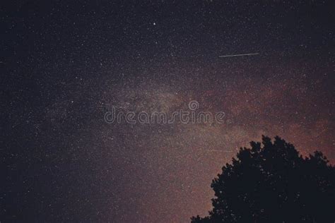 Night Sky With Milky Way Galaxy Shining Trough Stars And Planets Stock