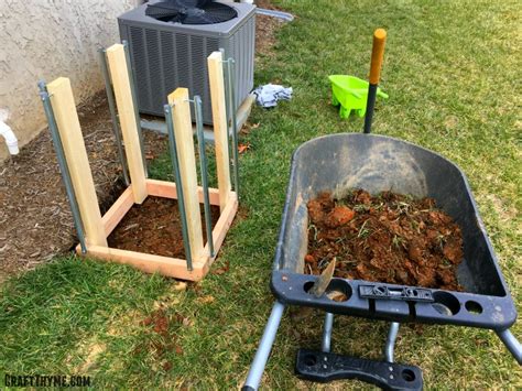 Stakes are pounded into the ground and thin boards are screwed onto the stakes to. How to Build Potato Boxes • Craft Thyme
