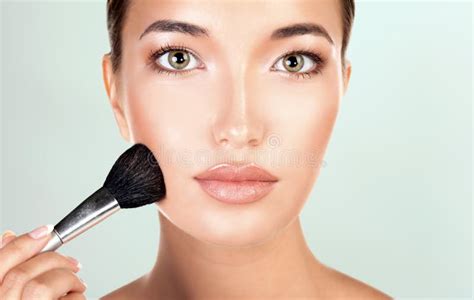 Pretty Woman Holds Makeup Brush Stock Photo Image Of Caucasian