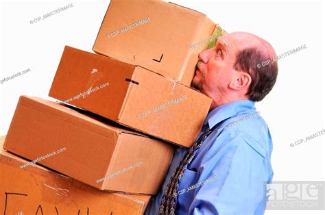 Man Carrying Heavy Boxes Stock Photo Picture And Low Budget Royalty