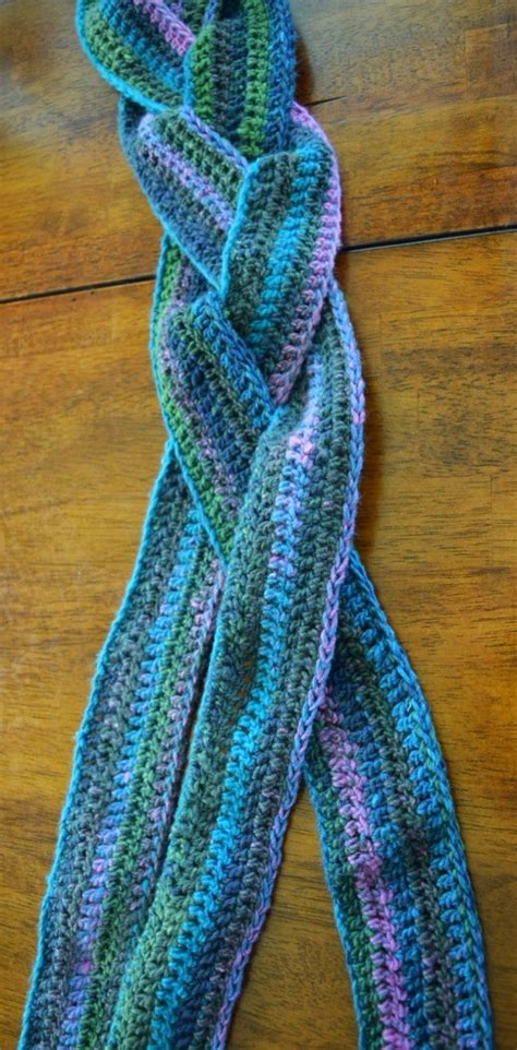 To keep your braid nice and secure, fasten the last loop and end together on either side of the scarf. Crochet Braided Infinity Scarf - Easy and free pattern ...