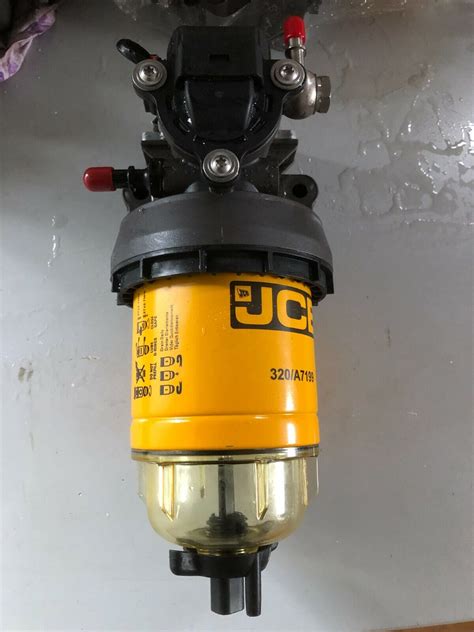 Genuine Jcb Fuel Pump Filter And Housing Filter 320a7199 Pump320