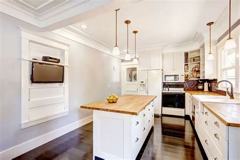 This huge farmhouse kitchen island from ana white is loaded with storage. Beyond the Rectangle: 11 Cool Kitchen Island Ideas