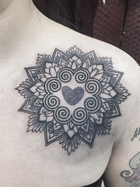 hmong-themed-mandala-with-parents-thumbprints-in-the-center-tattoo-hand-tattoos,-hmong-tattoo