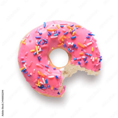 Pink Frosted Donut With Colorful Sprinkles With Bite Missing Isolated On White Background And