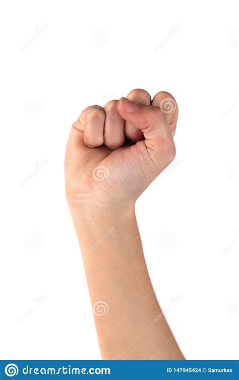 Woman Hand With Fingers Folded Into A Fist On Whte Background Stock