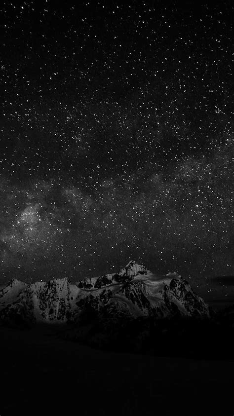 Download Dark Starry Night Over Snow Mountain Wallpaper