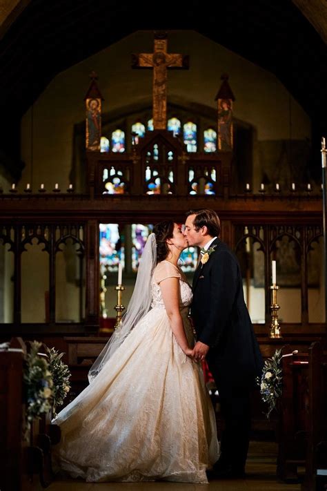 The Bride And Groom First Kiss In The Church From The Weekend Wedding