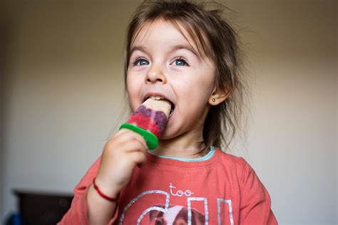 Girl Eating Popsicle · Free Stock Photo