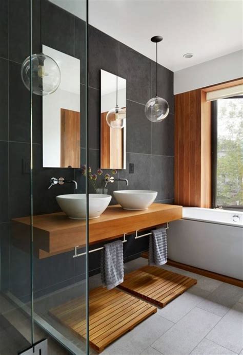 Dans cette salle de bains, tout est affaire de contrastes ! Comment créer une salle de bain zen?