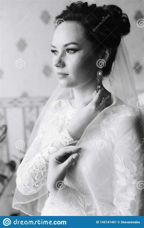 Morning Of The Bride A Beautiful Woman In A White Dress Is Preparing For The Wedding Stock