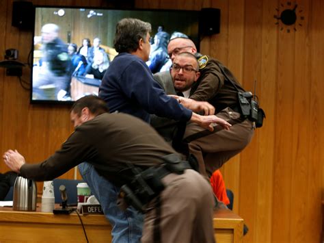 Randall margraves is tackled after he lunged at larry nassar. Victims' Father Lunges At Larry Nassar In Michigan ...