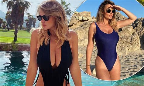 Rhian Sugden Puts On A Busty Display In A Plunging Black Swimsuit The
