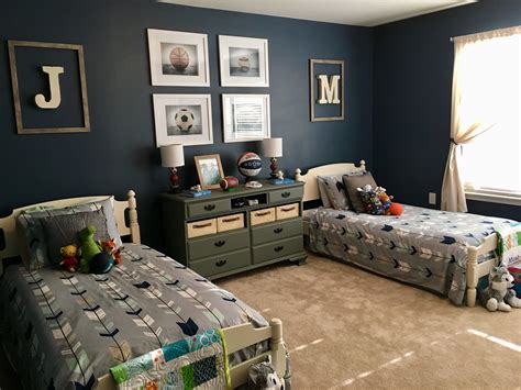 Lumberjack designs are a big win with boys and easy to incorporate with plaid bedding be a superhero to your young boys with this toddler bedroom idea. Twin Room | Boys room decor, Boys bedrooms, Teenage boy room