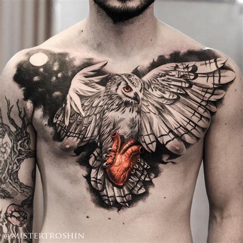 Owl Holding Heart Chest Tattoo