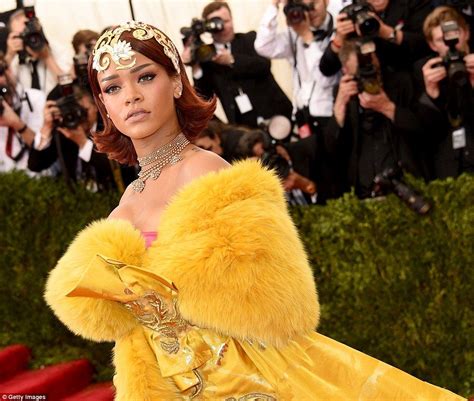 Rihanna Steals The Show In Huge Bright Yellow Gown At Met Gala Met
