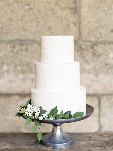 Simple Three Tiered White Wedding Cake Wedding Cake Bride Wedding Cakes Beautiful Wedding Cakes