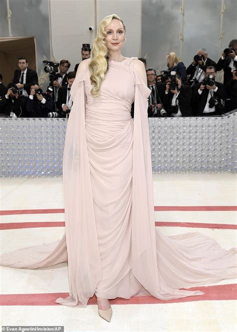 Met Gala Gwendoline Christie Turns Heads In A Baby Pink Fendi Gown With Floaty Sleeves